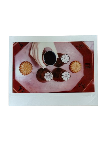 Tea cups and yakgwa arranged on a tray